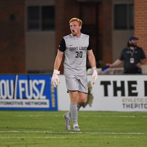 Saint Louis University's goalkeeper wearing the Fleur De Lis GK Nova Pro OG Palermo Trim in a match.