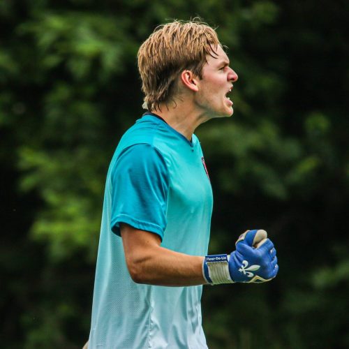 Goalkeeper wearing the Fleur de Lis Venum Pros Frost Trim Gloves.